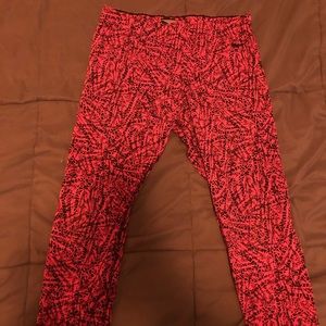 Two pairs of Nike workout pants size M